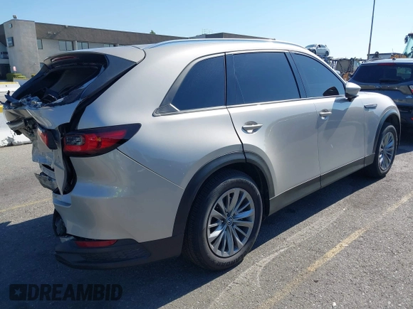 2024 Mazda CX-90 Preferred Plus with VIN JM3KKCHD2R1108548, listed as a IAAI auction lot 42214701 with 41,239 mi miles and . Bid and sale history available at DreamBid. Image 4.