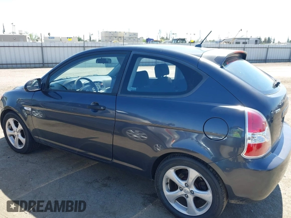 2007 Hyundai Accent SE with VIN KMHCN36C37U031369, listed as a IAAI auction lot 42093760 with 95,919 mi miles. Bid and sale history available at carsss.com. Image 14.
