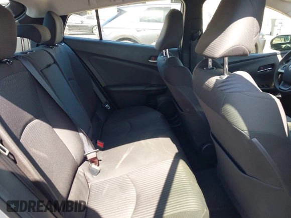 2016 Toyota Prius Two z VIN JTDKBRFU8G3007885, wystawiony jako IAAI lot #41980383 z przebiegiem 162 740 mil mil oraz . Historia ofert i sprzedaży dostępna na DreamBid. Obrazek 8.