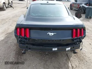 2017 Ford Mustang EcoBoost z VIN 1FA6P8TH3H5351723, wystawiony jako IAAI lot #41883990 z przebiegiem 120 520 mil mil oraz . Historia ofert i sprzedaży dostępna na DreamBid. Obrazek 6.