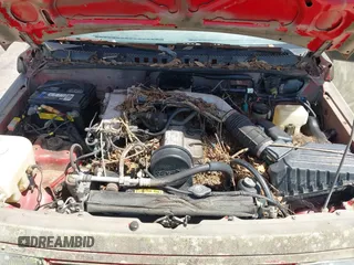 1995 Chevrolet Tracker z VIN 2CNBJ1869S6911342, wystawiony jako IAAI lot #42265392 z przebiegiem 121 944 mil mil oraz . Historia ofert i sprzedaży dostępna na DreamBid. Obrazek 10.