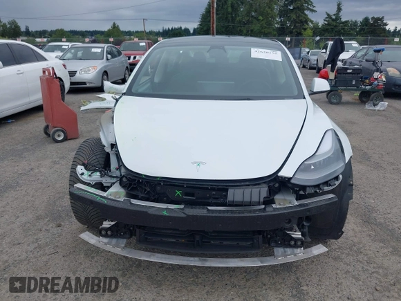 2023 Tesla Model 3 z VIN 5YJ3E1EA9PF431356, wystawiony jako IAAI lot #42620155 z przebiegiem 101 626 mil mil oraz . Historia ofert i sprzedaży dostępna na DreamBid. Obrazek 13.