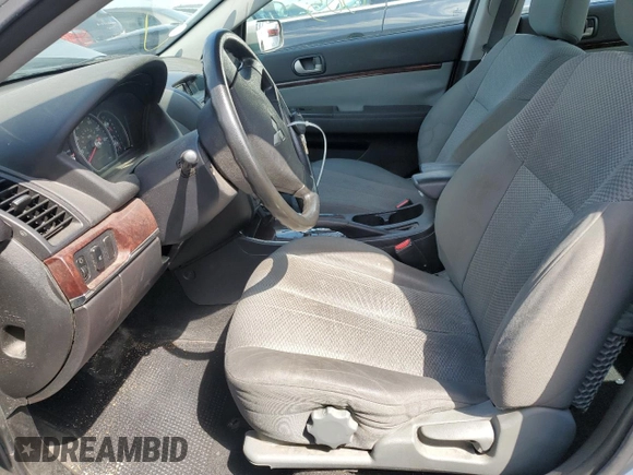 2009 Mitsubishi Galant ES z VIN 4A3AB36F59E031768, wystawiony jako Copart lot #51874305 z przebiegiem 141 638 mil mil oraz Szkoda całkowita • Salvage title. Historia ofert i sprzedaży dostępna na DreamBid. Obrazek 7.