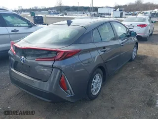 2021 Toyota Prius Prime LE with VIN JTDKAMFP4M3171775, listed as a IAAI auction lot 41343750 with 21,901 mi miles. Bid and sale history available at carsss.com. Image 4.