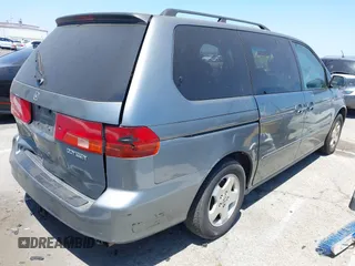 1999 Honda Odyssey EX z VIN 2HKRL1861XH549362, wystawiony jako IAAI lot #42400965 z przebiegiem 193 403 mil mil oraz . Historia ofert i sprzedaży dostępna na DreamBid. Obrazek 4.