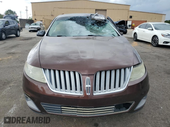 2009 Lincoln MKS z VIN 1LNHM93R89G601548, wystawiony jako Copart lot #54336075 z przebiegiem 318 143 mil mil oraz Szkoda całkowita • Salvage title. Historia ofert i sprzedaży dostępna na DreamBid. Obrazek 5.