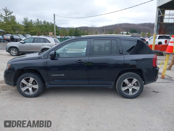 2016 Jeep Compass Latitude with VIN 1C4NJDEB8GD695268, listed as a IAAI auction lot 41724921 with 137,118 mi miles. Bid and sale history available at carsss.com. Image 14.