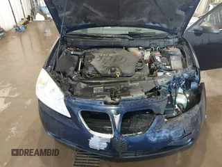 2009 Pontiac G6 GT 1SA z VIN 1G2ZH57NX94121112, wystawiony jako IAAI lot #41898403 z przebiegiem 155 100 mil mil oraz . Historia ofert i sprzedaży dostępna na DreamBid. Obrazek 10.