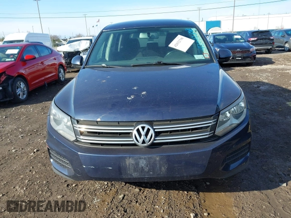 2014 Volkswagen Tiguan SE z VIN WVGAV3AX7EW541355, wystawiony jako IAAI lot #42032798 z przebiegiem 220 940 mil mil oraz . Historia ofert i sprzedaży dostępna na DreamBid. Obrazek 12.