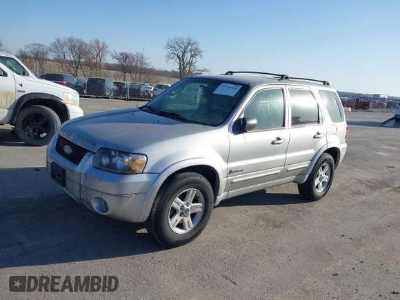 2006 Ford Escape Hybrid with VIN 1FMCU96H96KA25796, listed as a IAAI auction lot 41796914 with 119,809 mi miles and . Bid and sale history available at DreamBid. Image 2.