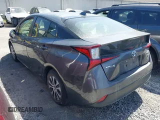 2022 Toyota Prius L Eco with VIN JTDKAMFU7N3154041, listed as a IAAI auction lot 41896210 with 46,382 mi miles and . Bid and sale history available at DreamBid. Image 3.