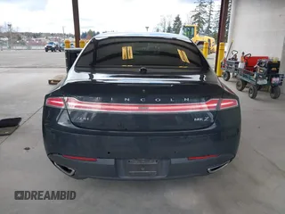2016 Lincoln MKZ Hybrid with VIN 3LN6L2LUXGR628147, listed as a IAAI auction lot 41815863 with 97,961 mi miles. Bid and sale history available at carsss.com. Image 16.