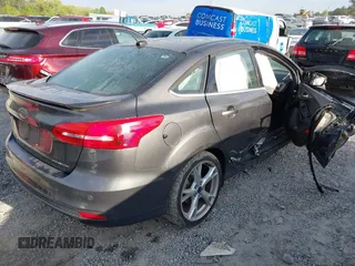 2016 Ford Focus Titanium with VIN 1FADP3J25GL282293, listed as a IAAI auction lot 41998959 with 119,781 mi miles and . Bid and sale history available at DreamBid. Image 4.