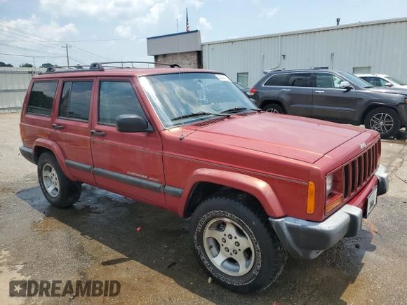 1999 Jeep Cherokee Sport with VIN 1J4FT68SXXL669549, listed as a Copart auction lot 62367015 with 194,446 mi miles and Salvage title. Bid and sale history available at DreamBid. Image 4.