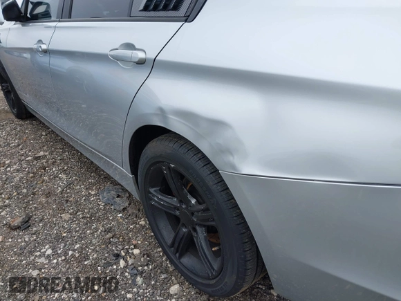 2014 BMW 3 Series 320i xDrive with VIN WBA3C3C58EP661364, listed as a IAAI auction lot 41947049 with 211,982 mi miles and . Bid and sale history available at DreamBid. Image 17.