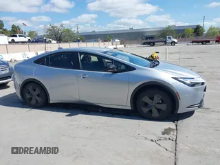2024 Toyota Prius LE with VIN JTDACAAU3R3024761, listed as a IAAI auction lot 41992059 with 14,119 mi miles and . Bid and sale history available at DreamBid. Image 14.