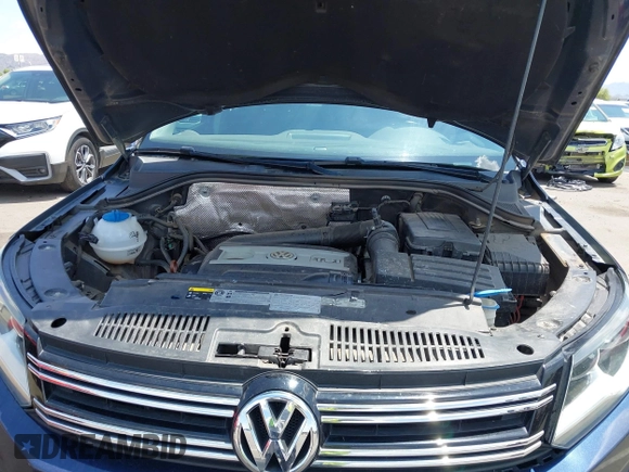 2013 Volkswagen Tiguan with VIN WVGCV3AX6DW605876, listed as a IAAI auction lot 42431619 with 106,279 mi miles and . Bid and sale history available at DreamBid. Image 10.