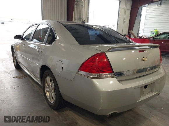 2014 Chevrolet Impala LS z VIN 2G1WA5E35E1177364, wystawiony jako IAAI lot #42343359 z przebiegiem 102 093 mil mil oraz . Historia ofert i sprzedaży dostępna na DreamBid. Obrazek 3.