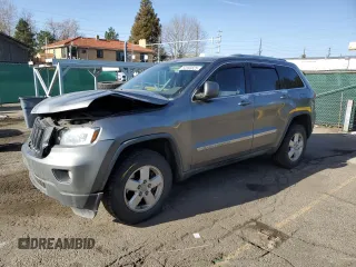 2011 Jeep Grand Cherokee Laredo with VIN 1J4RR4GG5BC578257, listed as a Copart auction lot 52393825 with 244,554 mi miles and Salvage Title. Bid and sale history available at carsss.com. Image 1.