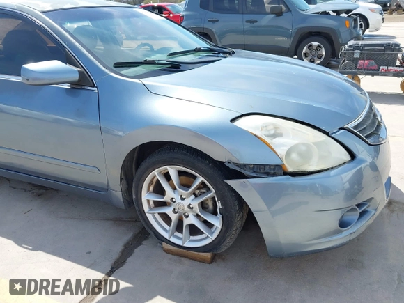 2010 Nissan Altima 2.5 S with VIN 1N4AL2AP4AC163890, listed as a IAAI auction lot 41664025 with 169,779 mi miles. Bid and sale history available at carsss.com. Image 18.