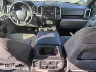 2019 Ford F-150 XL with VIN 1FTEW1E53KFB57102, listed as a Copart auction lot 61633055 with 86,949 mi miles and Salvage title. Bid and sale history available at DreamBid. Image 8.