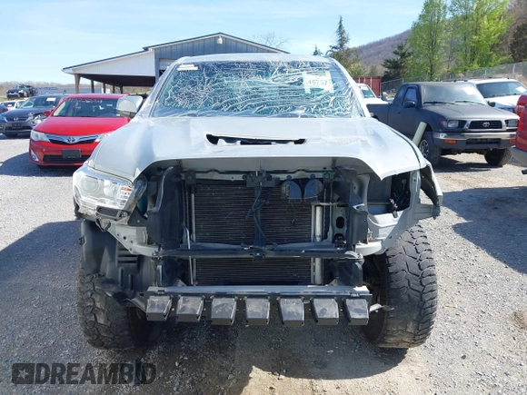 2020 Toyota Tacoma SR5 z VIN 5TFCZ5AN5LX229019, wystawiony jako IAAI lot #41907694 z przebiegiem 79 355 mil mil oraz . Historia ofert i sprzedaży dostępna na DreamBid. Obrazek 13.