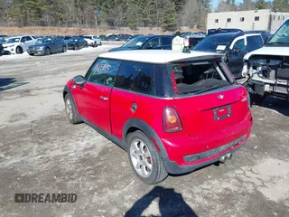 2009 MINI Hardtop S with VIN WMWMF73589TT95974, listed as a IAAI auction lot 41617775 with Not provided miles and . Bid and sale history available at DreamBid. Image 3.