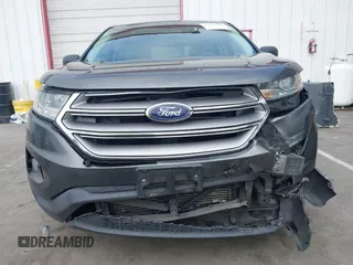 2017 Ford Edge SE z VIN 2FMPK3G97HBC65342, wystawiony jako IAAI lot #42610031 z przebiegiem 103 521 mil mil oraz . Historia ofert i sprzedaży dostępna na DreamBid. Obrazek 13.
