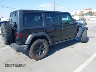 2020 Jeep Wrangler Unlimited Freedom with VIN 1C4HJXDG0LW238819, listed as a IAAI auction lot 42139357 with 67,619 mi miles and . Bid and sale history available at DreamBid. Image 4.