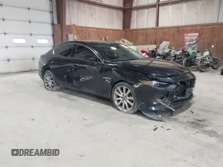 2020 Mazda 3 Premium with VIN 3MZBPBEM4LM123018, listed as a IAAI auction lot 41967652 with 84,642 mi miles and . Bid and sale history available at DreamBid. Image 1.
