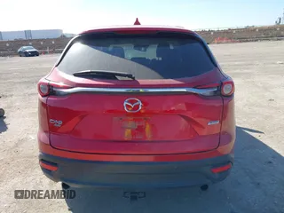 2016 Mazda CX-9 Touring z VIN JM3TCBCY7G0100311, wystawiony jako IAAI lot #41588448 z przebiegiem 115 364 mil mil oraz . Historia ofert i sprzedaży dostępna na DreamBid. Obrazek 16.