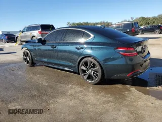 2023 Genesis G70 2.0T with VIN KMTG34TA5PU129955, listed as a Copart auction lot 82980774 with 12,625 mi miles and Salvage Title. Bid and sale history available at DreamBid. Image 2.