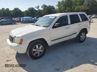 2008 Jeep Grand Cherokee Laredo with VIN 1J8GR48KX8C205085, listed as a Copart auction lot 52562135 with 147,786 mi miles and Salvage Title. Bid and sale history available at carsss.com. Image 1.