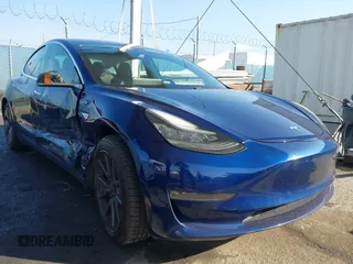 2018 Tesla Model 3 Long Range Battery z VIN 5YJ3E1EA8JF014706, wystawiony jako IAAI lot #41453650 z przebiegiem 68 037 mil mil oraz . Historia ofert i sprzedaży dostępna na DreamBid. Obrazek 1.