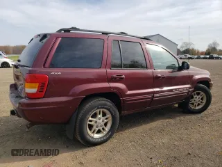1999 Jeep Grand Cherokee Limited with VIN 1J4GW68S5XC573162, listed as a Copart auction lot 78611274 with 174,960 mi miles and Salvage Title. Bid and sale history available at carsss.com. Image 3.