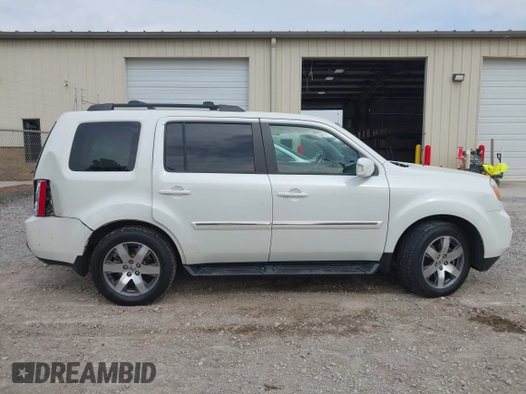 2014 Honda Pilot Touring with VIN 5FNYF4H93EB023602, listed as a IAAI auction lot 41909653 with 162,118 mi miles and . Bid and sale history available at carsss.com. Image 13.