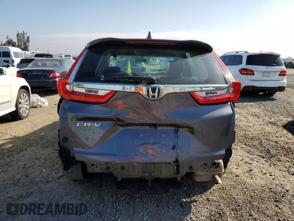 2019 Honda CR-V LX with VIN 2HKRW5H38KH418961, listed as a Copart auction lot 50594165 with 81,425 mi miles and Salvage Title. Bid and sale history available at DreamBid. Image 6.