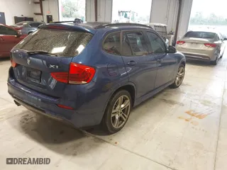 2015 BMW X1 xDrive28i with VIN WBAVL1C57FVY35998, listed as a IAAI auction lot 41740072 with 84,233 mi miles. Bid and sale history available at carsss.com. Image 4.