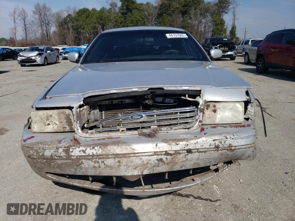 2003 Ford Police Interceptor Street Appear with VIN 2FAFP71WX3X110275, listed as a Copart auction lot 44157665 with 275,661 mi miles and Salvage title. Bid and sale history available at DreamBid. Image 5.