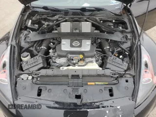 2017 Nissan 370Z z VIN JN1AZ4EH0HM953203, wystawiony jako Copart lot #85980784 z przebiegiem 46 276 mil mil oraz Szkoda całkowita • Salvage title. Historia ofert i sprzedaży dostępna na DreamBid. Obrazek 11.