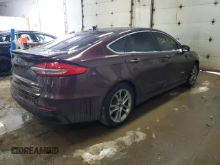 2019 Ford Fusion Hybrid Titanium with VIN 3FA6P0RU2KR211799, listed as a Copart auction lot 70843212 with 54,157 mi miles. Bid and sale history available at carsss.com. Image 3.