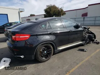 2011 BMW X6 50i with VIN 5UXFG8C52BLZ95196, listed as a Copart auction lot 79100194 with 0 mi miles and Salvage Title. Bid and sale history available at carsss.com. Image 3.
