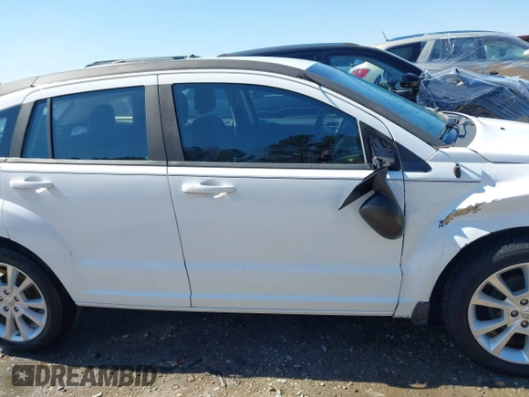 2011 Dodge Caliber Heat with VIN 1B3CB5HA6BD179014, listed as a IAAI auction lot 41704508 with 188,127 mi miles and . Bid and sale history available at DreamBid. Image 13.