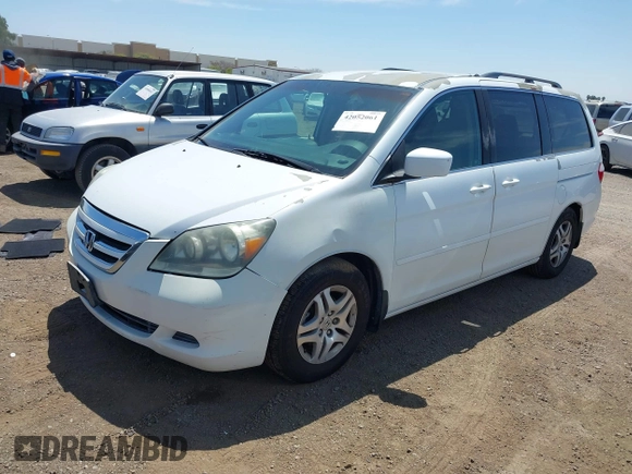 2007 Honda Odyssey EX with VIN 5FNRL38487B075936, listed as a IAAI auction lot 42052061 with 188,279 mi miles and . Bid and sale history available at DreamBid. Image 2.