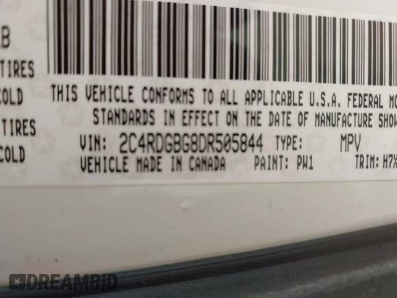 2013 Dodge Grand Caravan SE with VIN 2C4RDGBG8DR505844, listed as a IAAI auction lot 42139152 with 206,399 mi miles and . Bid and sale history available at DreamBid. Image 9.