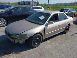 2002 Honda Accord LX with VIN 3HGCG56412G702456, listed as a IAAI auction lot 42040650 with 203,310 mi miles and . Bid and sale history available at DreamBid. Image 2.