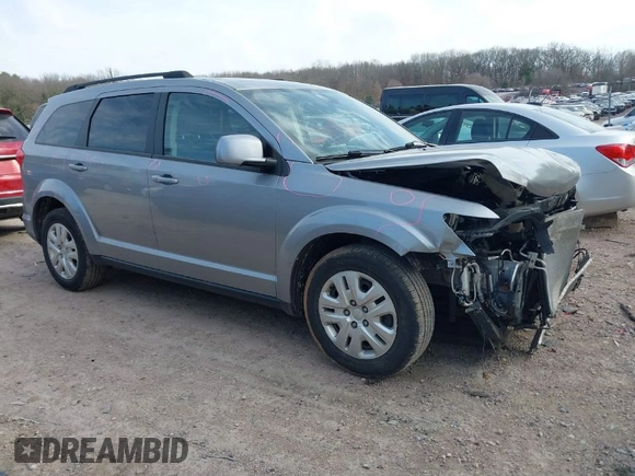 2019 Dodge Journey SE with VIN 3C4PDCBB0KT719211, listed as a IAAI auction lot 41823499 with 151,569 mi miles and . Bid and sale history available at DreamBid. Image 1.