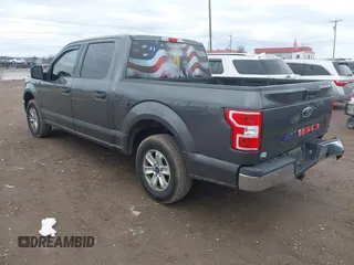 2019 Ford F-150 XL with VIN 1FTEW1CBXKFC64236, listed as a IAAI auction lot 41531279 with 102,965 mi miles and . Bid and sale history available at carsss.com. Image 3.