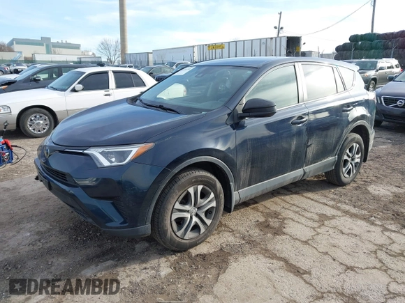 2018 Toyota RAV4 LE with VIN JTMBFREV5JD253342, listed as a IAAI auction lot 41656581 with 243,791 mi miles and . Bid and sale history available at DreamBid. Image 18.