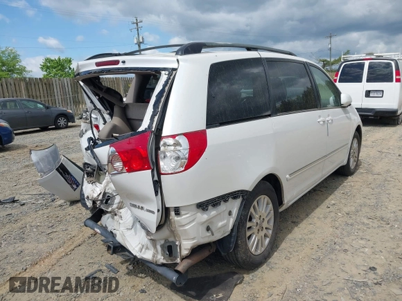 2007 Toyota Sienna XLE with VIN 5TDZK22C57S074123, listed as a IAAI auction lot 42128064 with 184,183 mi miles and . Bid and sale history available at DreamBid. Image 4.